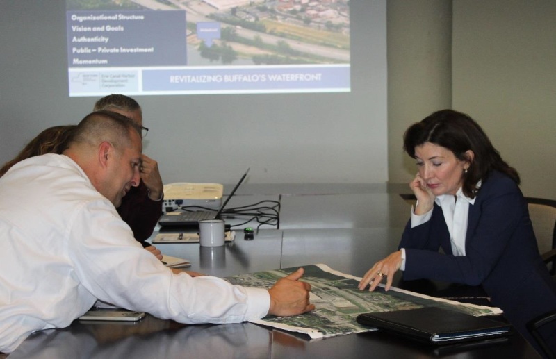 County Executive Matthew L. Ossenfort reviews a map of the Exit 29 Redevelopment Project with Lt. Gov. Kathy Hochul in Buffalo.