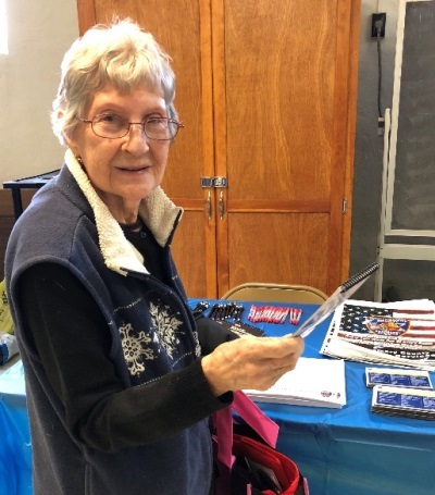 Susan Zepperi, Amsterdam, pictured Thursday with information from the Emergency Services table during the Senior Meet and Greet.